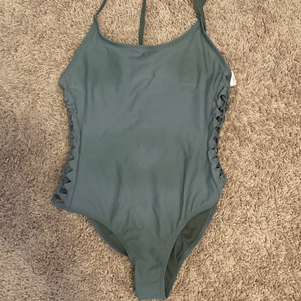 Green one-piece swimsuit